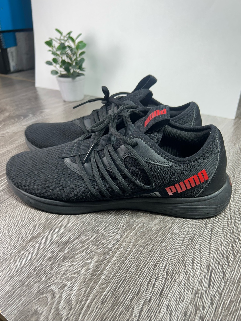 Puma Black Sneakers with Red Accent Logo